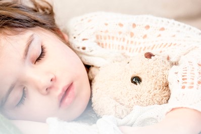 girl sleeping on clean carpet